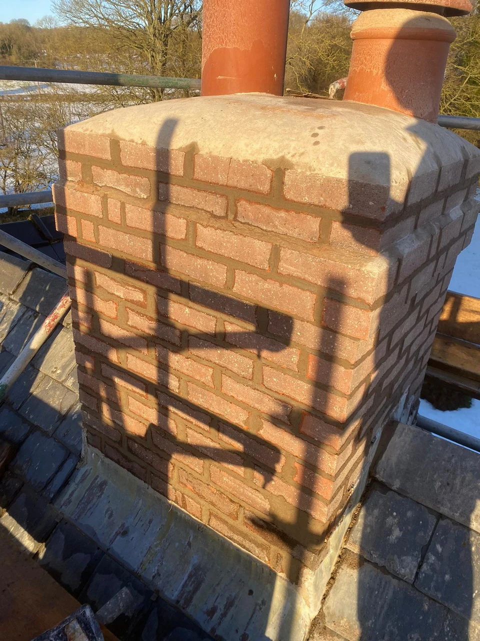 New lead flashing around a chimney in Mold, Flintshire