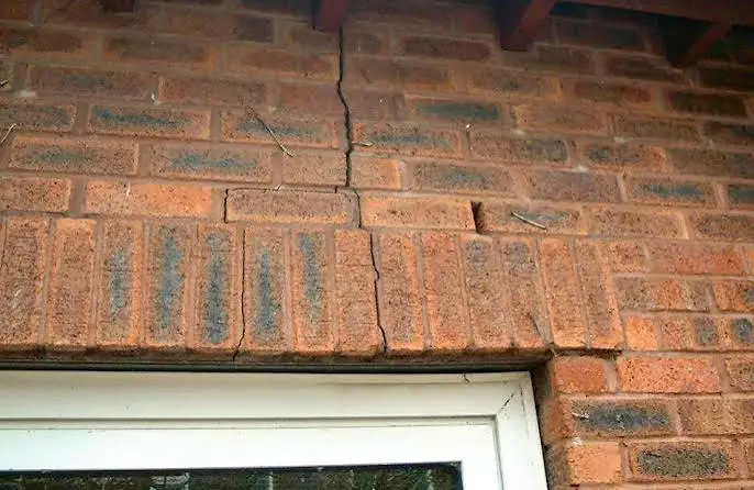 Cracked lintel above a window on a Victorian terrace in Hoole, Chester