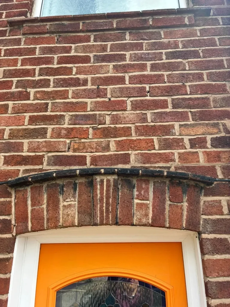 Emergency repair to damaged brickwork above a front door in Chester
