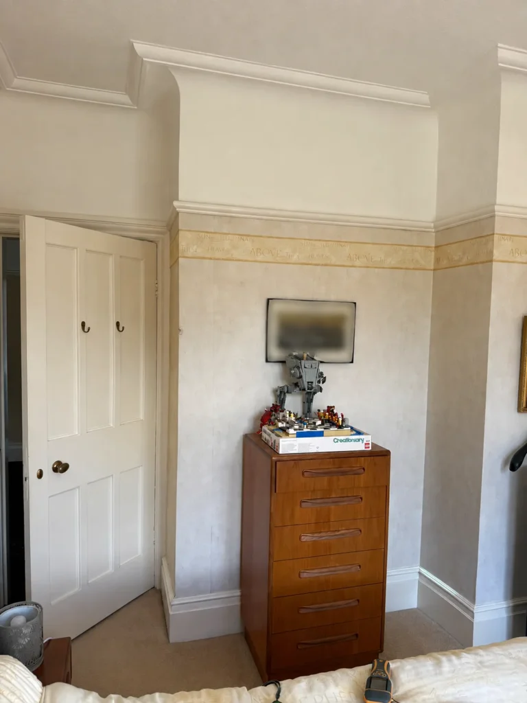 Bedroom chimney breast inspected during a damp survey at a property in Wirral