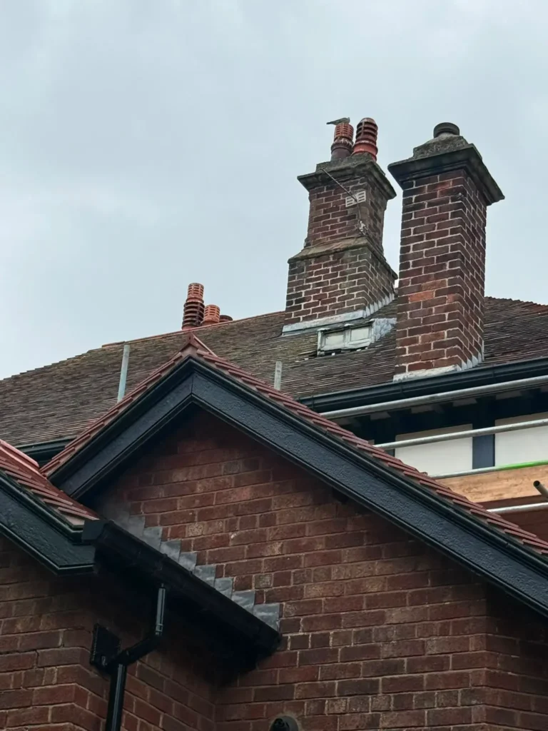 Chimney stack and tiled roof inspection for water ingress at Wirral property