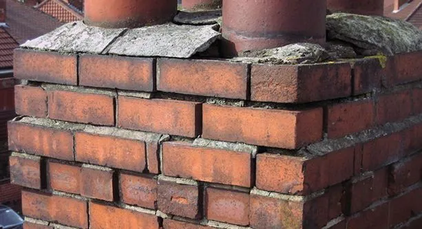 Salt-weathered chimney stack repointed in Wallasey, Wirral