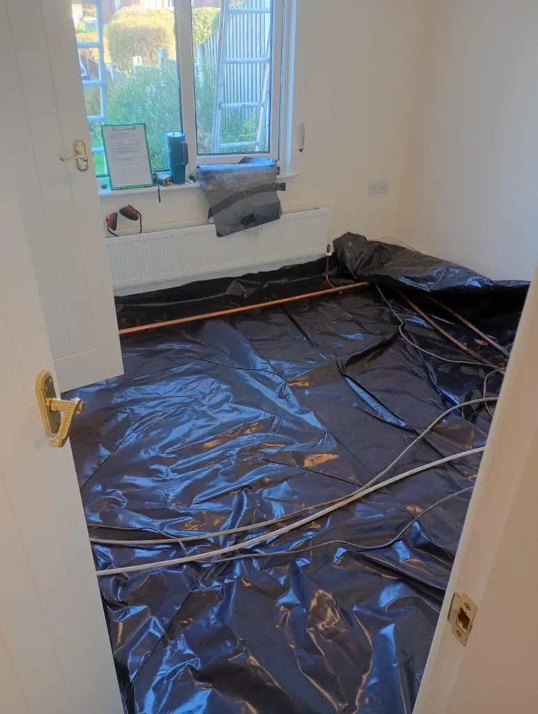 Collapsed floor repairs with new damp proof membrane before floor reconstruction