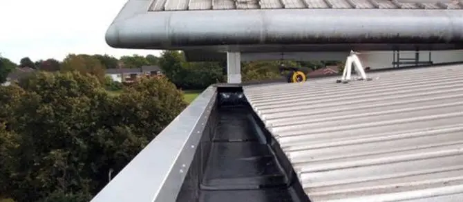 Gutter and flashing repairs on a business park unit, Wirral