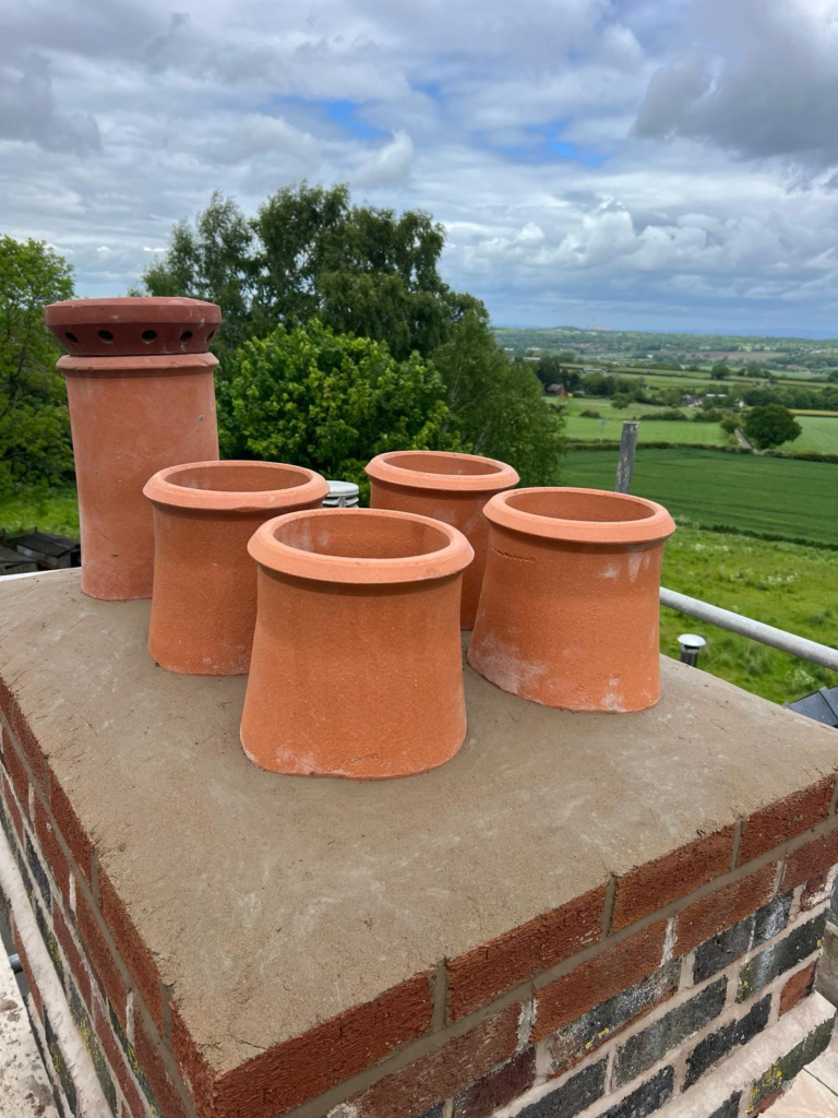 Rebuilt chimney stack with chimney pots in Flintshire