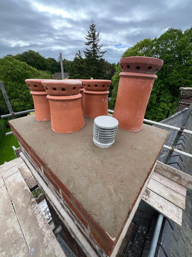 New chimney crown and reinstated chimney pots in Flintshire
