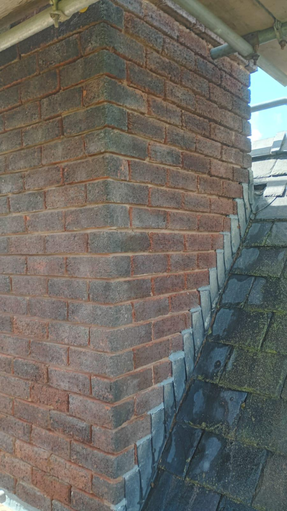 Chimney brickwork joints raked out up to 30mm ready for repointing in Flintshire