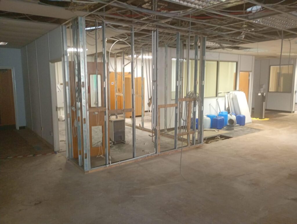 Flood-damaged interior stripped back ready for drying and reinstatement works