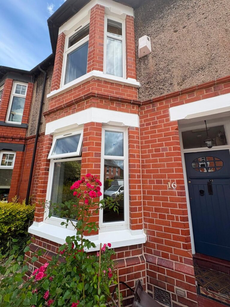 Weathered brickwork before lime mortar repointing in Chester