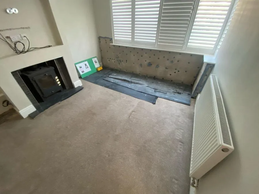 Studded damp proof membrane fitted to bay window walls in Chester