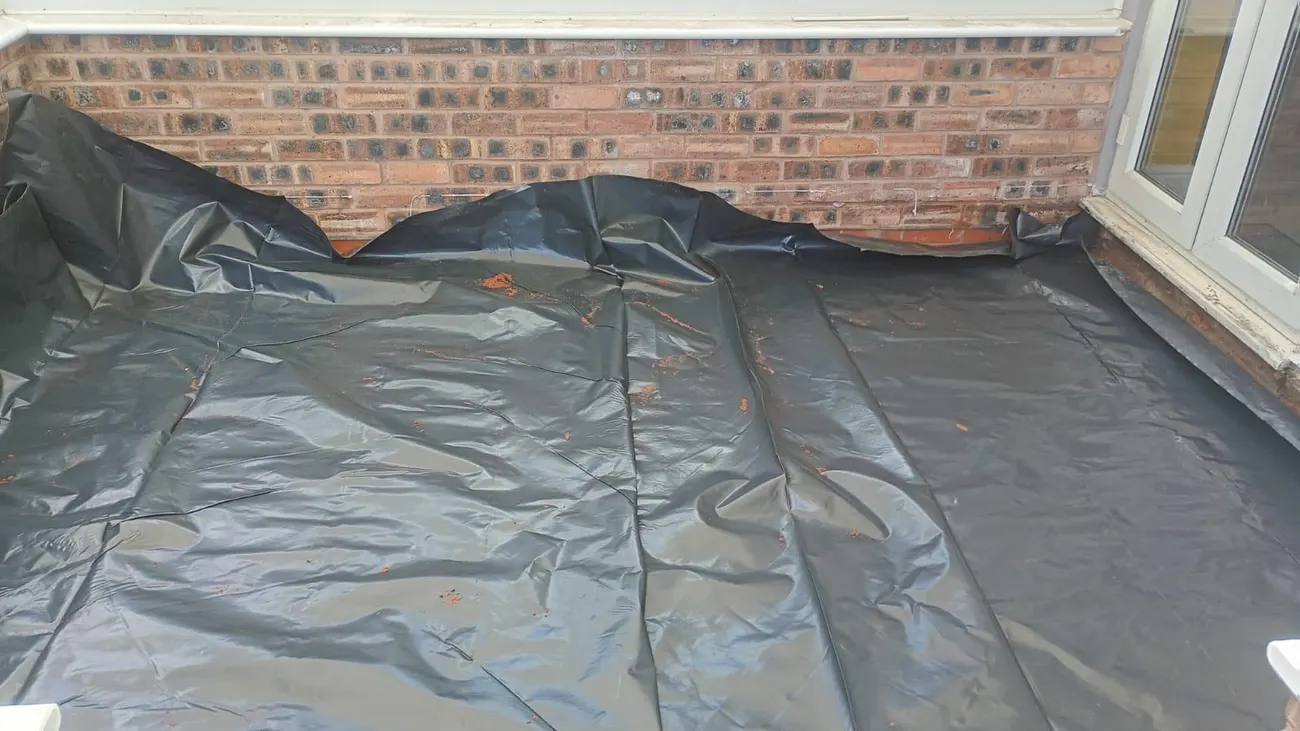 Damp proof membrane laid over a new floor screed in Chester