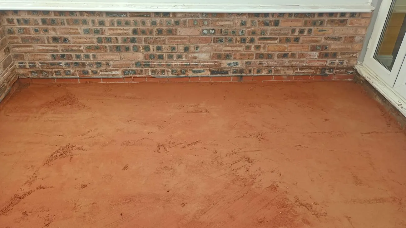 New floor screed laid during damp proofing floor renewal in Chester