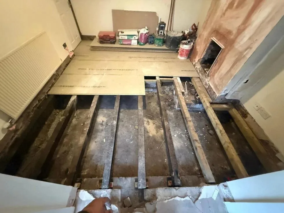Replacing rotten timber floor joists during a suspended timber floor repair to restore structural stability