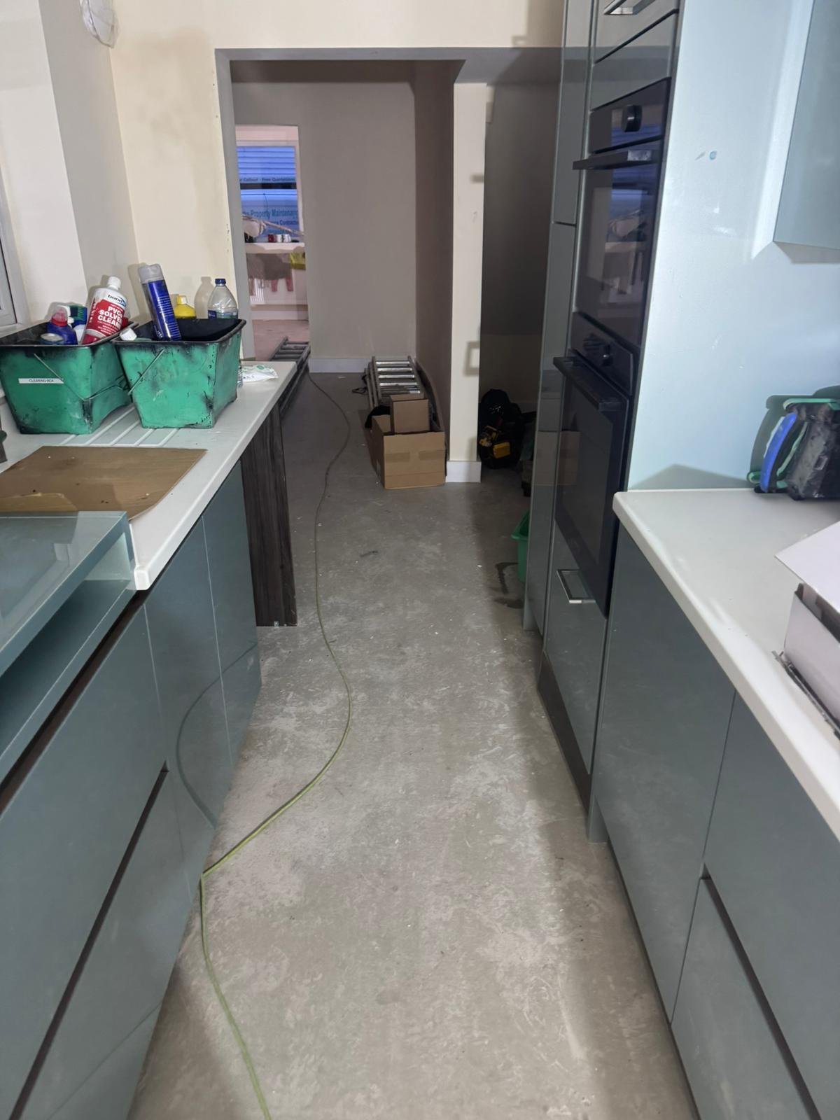 Kitchen installed over a new 25mm screed laid on a liquid damp-proof membrane