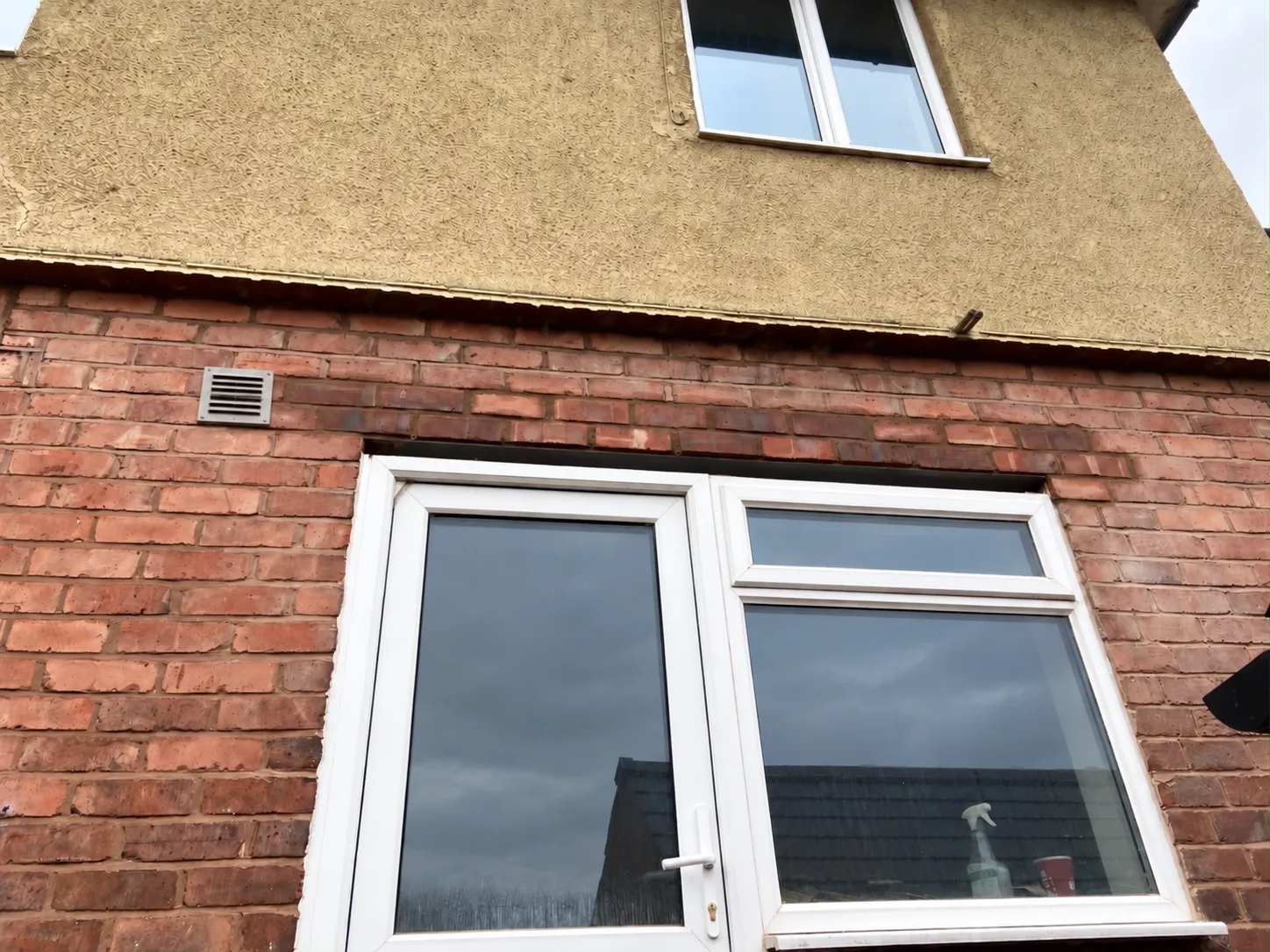 Rebuilt brickwork over the opening after galvanised steel lintel installation, Chester