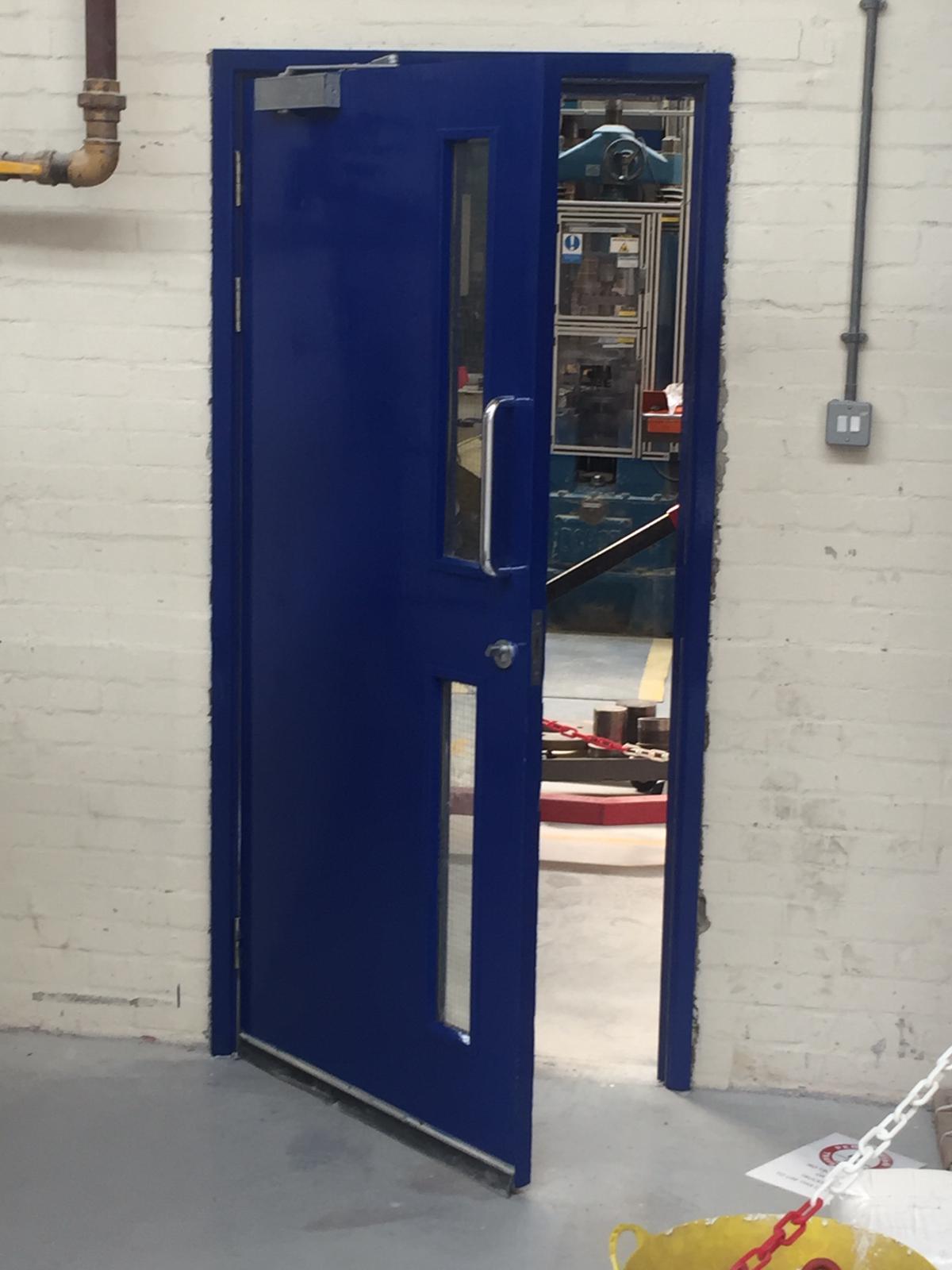 Fire exit door work by Quirks Property Maintenance