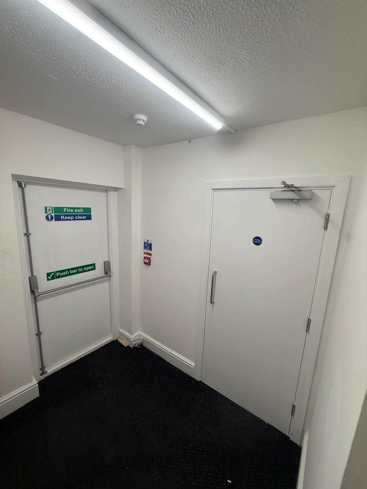 Fire exit door work by Quirks Property Maintenance