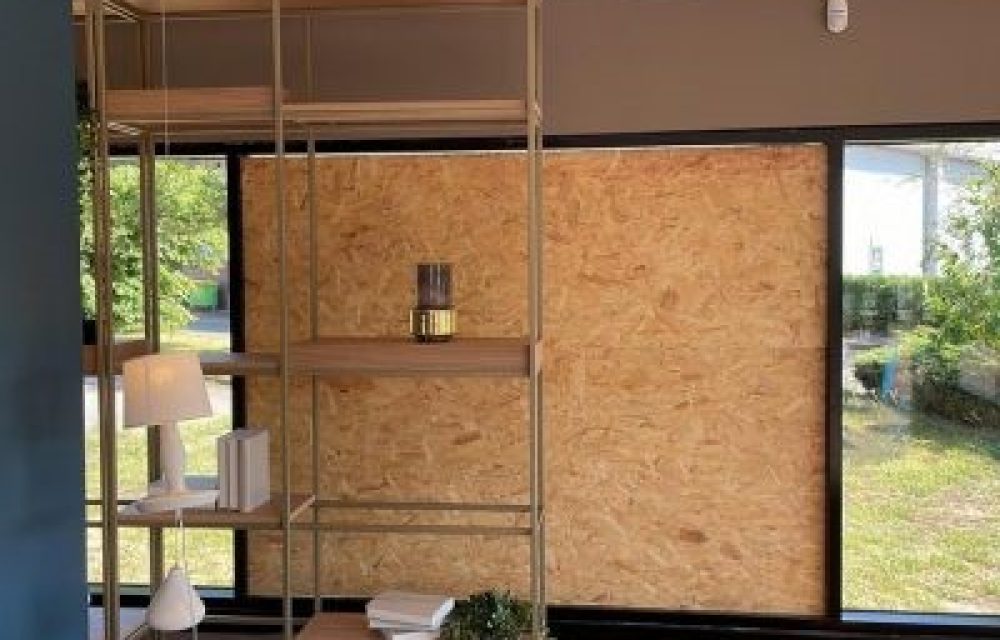 Boarded shopfront on a high street secured overnight